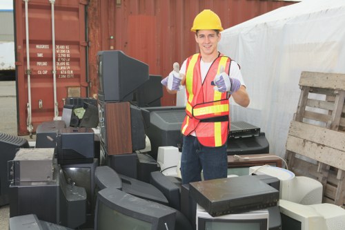 Professionals clearing furniture in Wembley