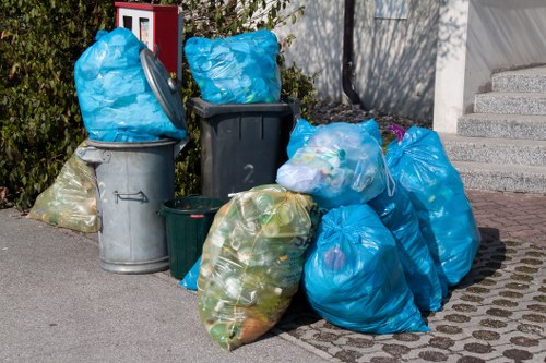 Professional rubbish clearance team at a Wembley home